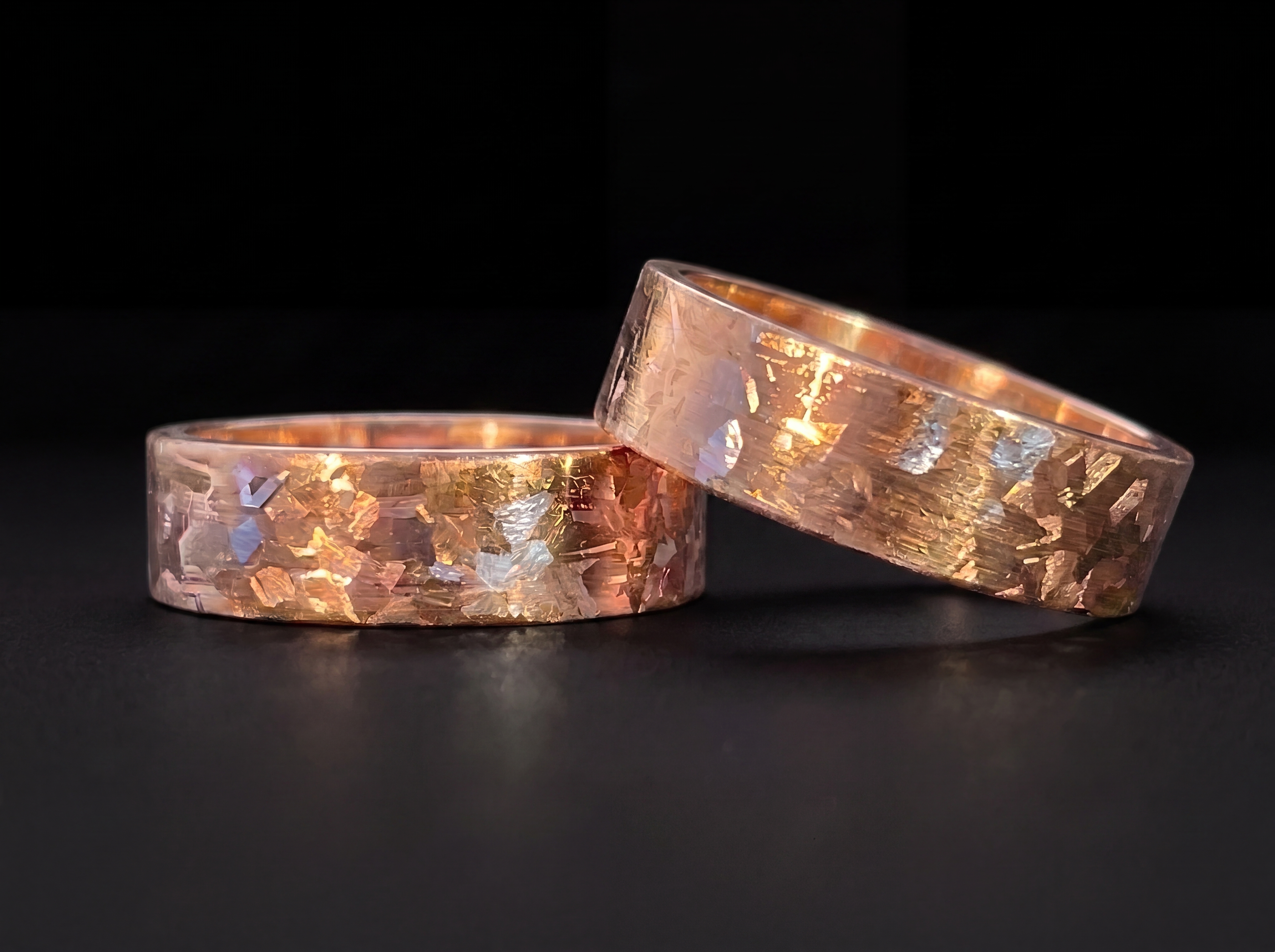 Two Cuprite rings stacked, showing crystalline texture